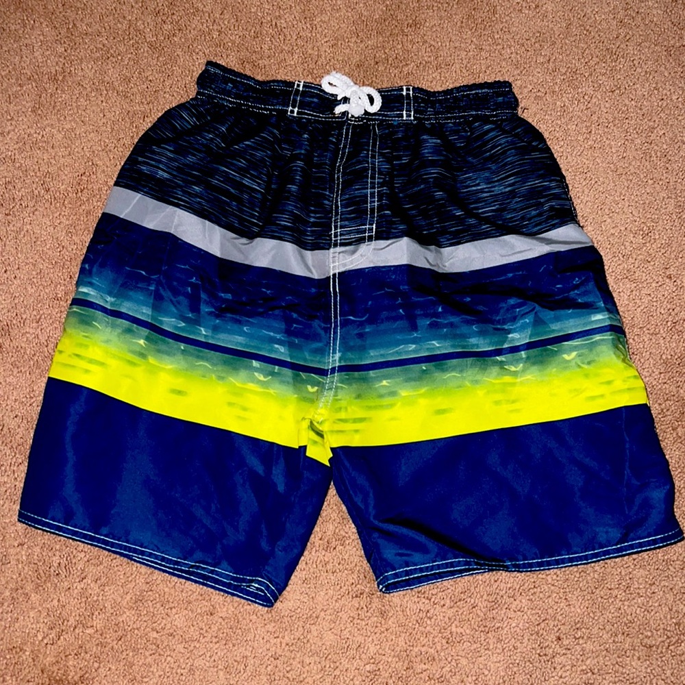 A kids Blue,Gray,and Green Swimsuit